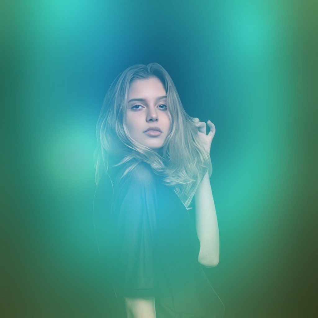 Blue and cyan aura rendering over a dark portrait background.